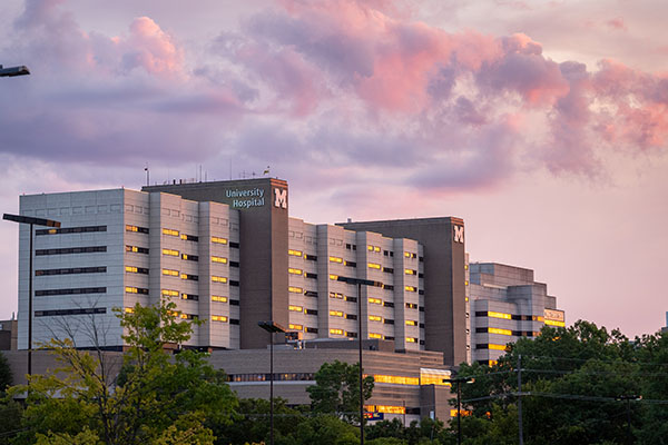 Sunset and purple clouds over University Hospital